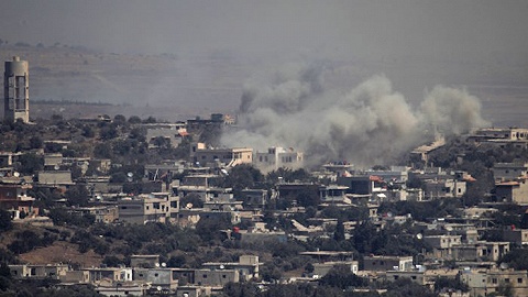 After border fire, Syria uses rare missile